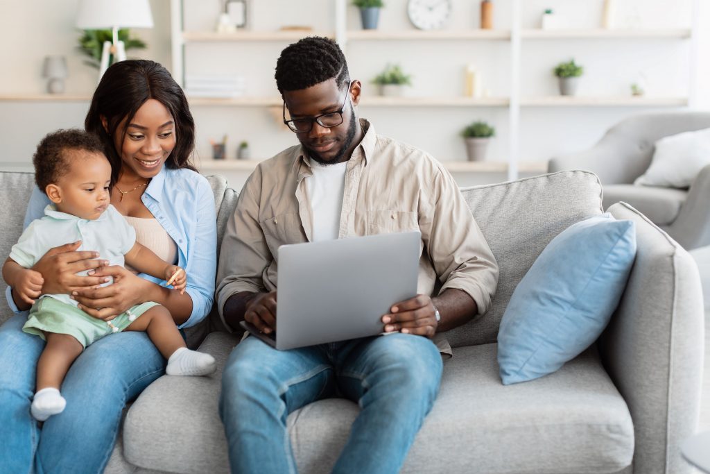 Black Family Using Computer - Estate Planning